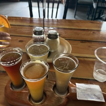 Butte Brewing Company - Flight and a Hefe with an orange peel - Breweries Near Me - Butte, Montana Butte Brewing Company - Flight and a Hefe with an orange peel - Breweries Near Me - Butte, Montana