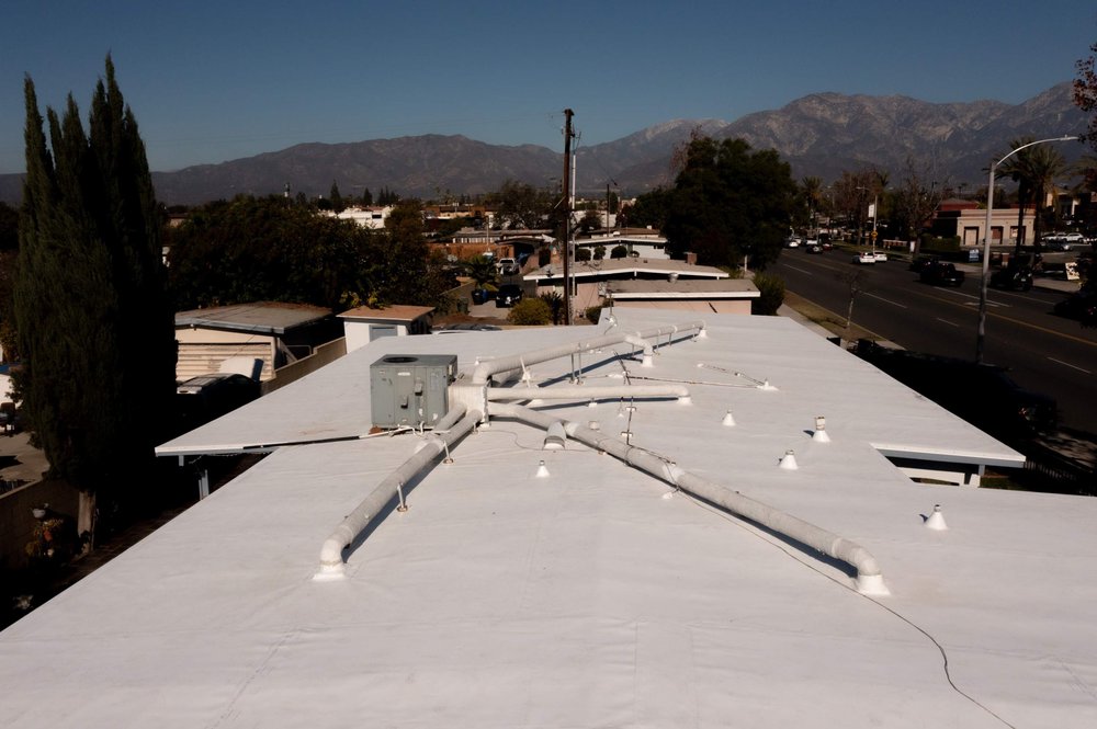 Slide of LV-M Roofing Services