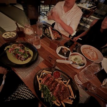 Huntress - Bavette Frites, Citrus Half Chicken, Shrimp & Mussel Spaghetti - Steakhouses Near Me - San Diego, California Huntress - Bavette Frites, Citrus Half Chicken, Shrimp & Mussel Spaghetti - Steakhouses Near Me - San Diego, California