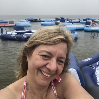 Seacrets - Sitting in the water at a table with chairs - Bars Near Me - Ocean City, Maryland