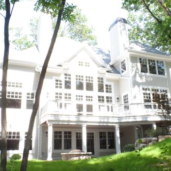 J Timothy Builders - a large white house in the woods - General Contractors Near Me - Elkhorn, Wisconsin