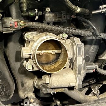 Discount Car Care - When the head crack was fixed the throttle body should've been cleaned and clearly wasn't. - Auto Repair Near Me - Katy, Texas