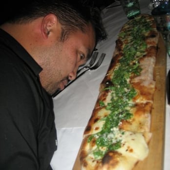 Lavo - Reggie was a bit surprised by the size of his two foot long pizza! - Italian Near Me - Las Vegas, Nevada Lavo - Reggie was a bit surprised by the size of his two foot long pizza! - Italian Near Me - Las Vegas, Nevada