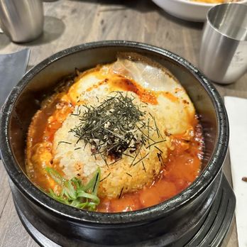 Ewha Shiro - a bowl of food on a table - Korean Near Me - Montreal, Quebec Ewha Shiro - a bowl of food on a table - Korean Near Me - Montreal, Quebec