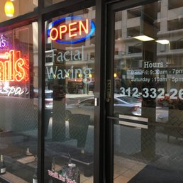 Entrance with hours and telephone number Entrance with hours and telephone number