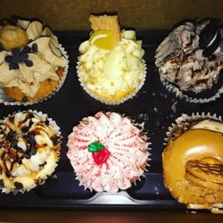 Gigi's Cupcakes - Cookie dough, Lemon, Oreo, Bourbon Turtle Cheesecake, Strawberry, & Peanut Butter.