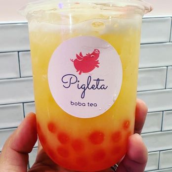 Pigleta Boba - a hand holding a cup of boba - Bubble Tea Near Me - Point Pleasant Beach, New Jersey Pigleta Boba - a hand holding a cup of boba - Bubble Tea Near Me - Point Pleasant Beach, New Jersey