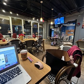 Fenton Cafe - a laptop on a wooden table - Creperies Near Me - Silver Spring, Maryland