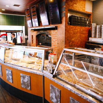 Italia Express Cedar Springs - a view of the counter area of a restaurant - Italian Near Me - Dallas, Texas Italia Express Cedar Springs - a view of the counter area of a restaurant - Italian Near Me - Dallas, Texas