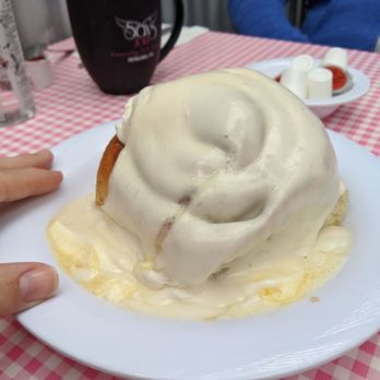 Sax's Joint - Gigantic cinnamon roll, hand for size - Breakfast & Brunch Near Me - Petaluma, California Sax's Joint - Gigantic cinnamon roll, hand for size - Breakfast & Brunch Near Me - Petaluma, California