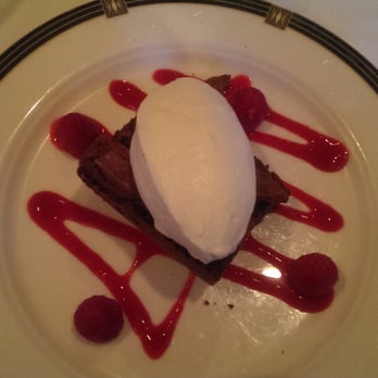 Nell's Restaurant - Restaurant week: brownie with creme fraiche and raspberries - New American Near Me - Seattle, Washington