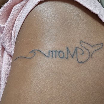 Hula Girl Tattoo - This is what it looks like today. - Piercing Near Me - Paia, Hawaii