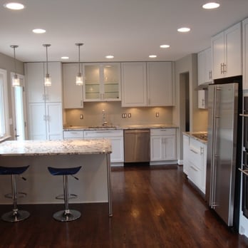 Ultimate Remodel - a clean kitchen with white cabinets and stainless steel appliances - General Contractors Near Me - Alexandria, Virginia Ultimate Remodel - a clean kitchen with white cabinets and stainless steel appliances - General Contractors Near Me - Alexandria, Virginia