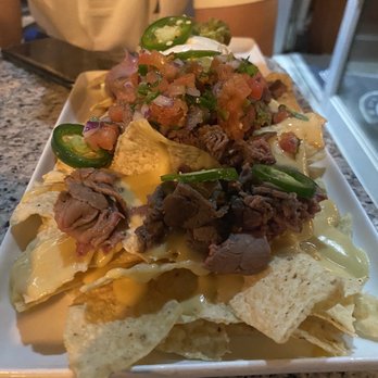 Taps Restaurant Bar & Lounge - Beer Queso Nachos - Tapas/Small Plates Near Me - Tampa, Florida Taps Restaurant Bar & Lounge - Beer Queso Nachos - Tapas/Small Plates Near Me - Tampa, Florida