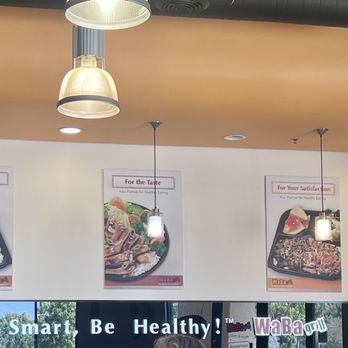 WaBa Grill - a woman sitting at the counter - Fast Food Near Me - Temecula, California