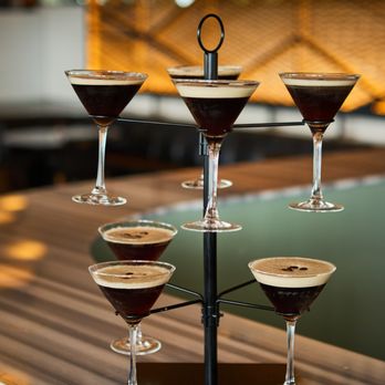 Current - a display of different types of drinks - Cocktail Bars Near Me - Chicago, Illinois Current - a display of different types of drinks - Cocktail Bars Near Me - Chicago, Illinois