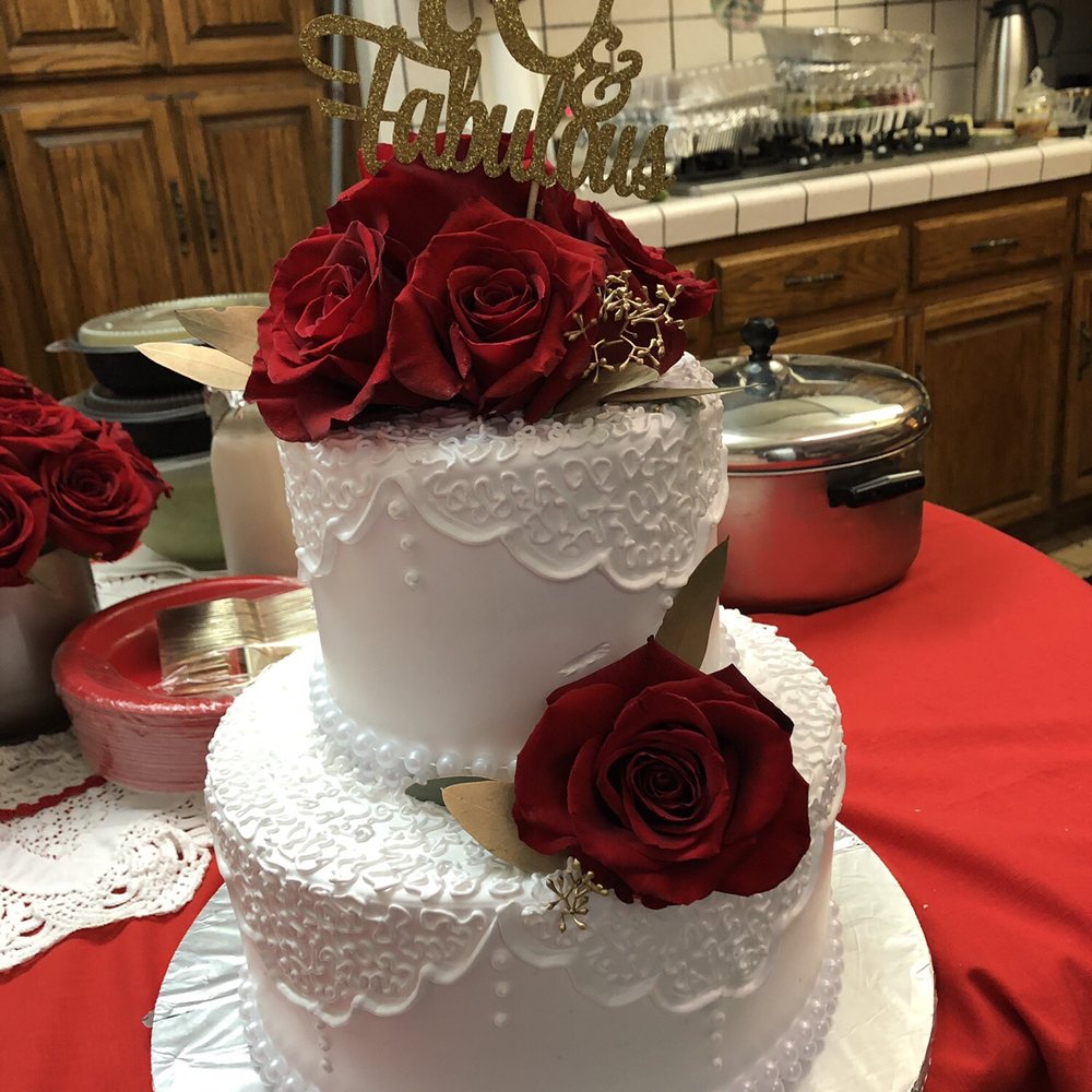 April's Cakes - An elegant cake for my mom's 70th birthday. The huge roses with gold leaves we're great touch. - Bakeries Near Me - Montebello, California April's Cakes - An elegant cake for my mom's 70th birthday. The huge roses with gold leaves we're great touch. - Bakeries Near Me - Montebello, California