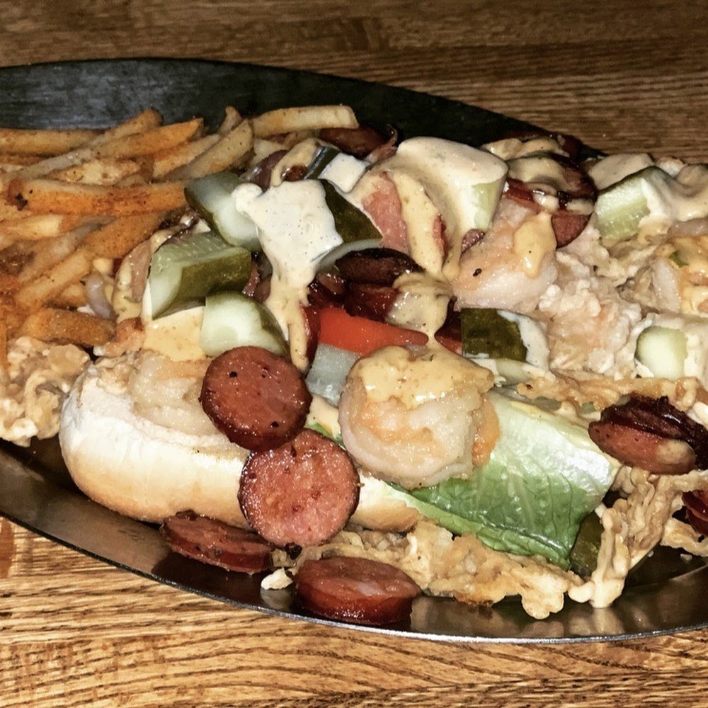 Andouille and shrimp Po Boy with Cajun fries! Andouille and shrimp Po Boy with Cajun fries!