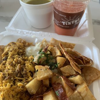 Tiztal Cafe - Chilaquiles with Chorizo and Eggs and 6. Papaya Strawberry Orange Smoothie - Breakfast & Brunch Near Me - Chicago, Illinois