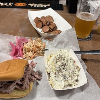 Ol’ Bart - Between the buns, jalapeño cheddar sausage and real potato salad. I would order it like this again! - Beer Bar Near Me - North Little Rock, Arkansas Ol’ Bart - Between the buns, jalapeño cheddar sausage and real potato salad. I would order it like this again! - Beer Bar Near Me - North Little Rock, Arkansas