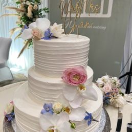 Our wedding coordinator did an amazing job decorating our 3 tier wedding cake!
