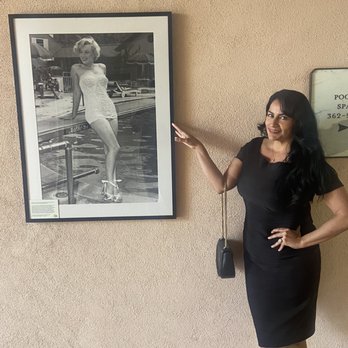 Hotel Bel-Air - Hollywood  legends portraits throughout the entire hallways. - Hotels Near Me - Los Angeles, California