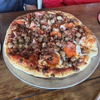 The Growler Bar and Kitchen - Meat Pizza - Beer Bar Near Me - Pflugerville, Texas The Growler Bar and Kitchen - Meat Pizza - Beer Bar Near Me - Pflugerville, Texas