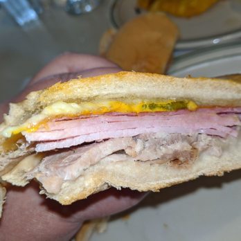 Versailles - Close up of Classic Cuban Sandwich...needs more pickles (IMO), but so good!! - Cuban Near Me - Miami, Florida Versailles - Close up of Classic Cuban Sandwich...needs more pickles (IMO), but so good!! - Cuban Near Me - Miami, Florida