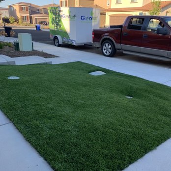 Geoturf Landscape - a truck parked in front of a house - Landscape Architects or Designers Near Me