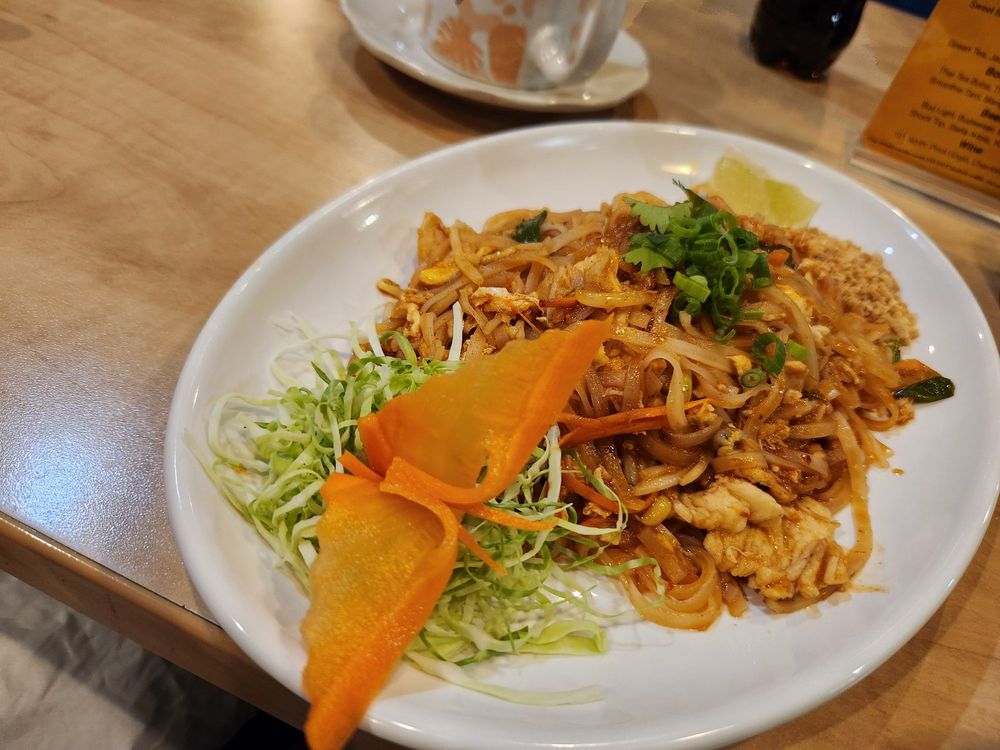 Tip Thai Cuisine Logo