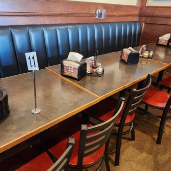 Barro's Pizza - a row of booths with tables and chairs - Pizza Near Me - Peoria, Arizona