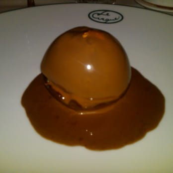 Le Cirque - Chocolate sphere, praline mousse, white chocolate ice cream, hazelnut caramel crunch, chocolate sauce - French Near Me - Las Vegas, Nevada Le Cirque - Chocolate sphere, praline mousse, white chocolate ice cream, hazelnut caramel crunch, chocolate sauce - French Near Me - Las Vegas, Nevada