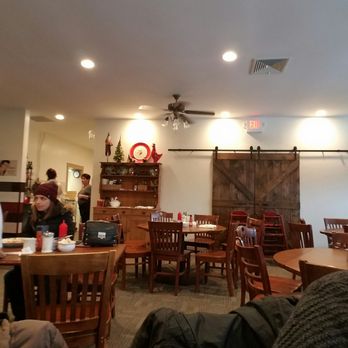 The Howling Rooster - Sliding barn doors & seating at the new Englewood location - Breakfast & Brunch Near Me - Buffalo, New York The Howling Rooster - Sliding barn doors & seating at the new Englewood location - Breakfast & Brunch Near Me - Buffalo, New York