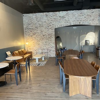 The Grind Cafe - a long table and chairs - Coffee & Tea Near Me - Midland, Texas The Grind Cafe - a long table and chairs - Coffee & Tea Near Me - Midland, Texas
