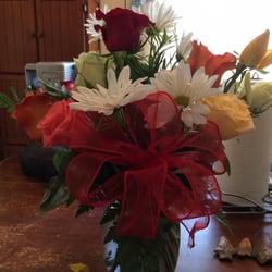 Nosegay Florist - This is also what was delivered. They don't look anything like the order. Nothing, from the flowers to the vase match.