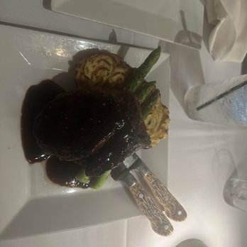 Jack Ryan's Steak and Chophouse - Ribeye Steak w/ twice baked potato and grilled asparagus - New American Near Me - Kilgore, Texas Jack Ryan's Steak and Chophouse - Ribeye Steak w/ twice baked potato and grilled asparagus - New American Near Me - Kilgore, Texas
