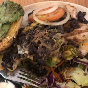 Coco Cantina - Unappetizing fish sandwich covered in black beans. - Mexican Near Me - Hilo, Hawaii