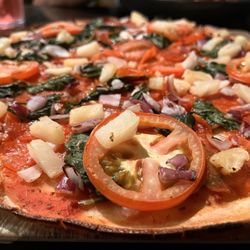 Bondi Pizza Parramatta - Gluten free pizza. It was vegan as well and I chose to remove the vegan cheese. Added my own pineapple, red onions and spinach. Yum!