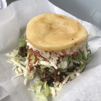 Milly's Empanada Factory - Pork Arepas Freitas! Awesome fried and still hot bread. - Venezuelan Near Me - Miami, Florida Milly's Empanada Factory - Pork Arepas Freitas! Awesome fried and still hot bread. - Venezuelan Near Me - Miami, Florida