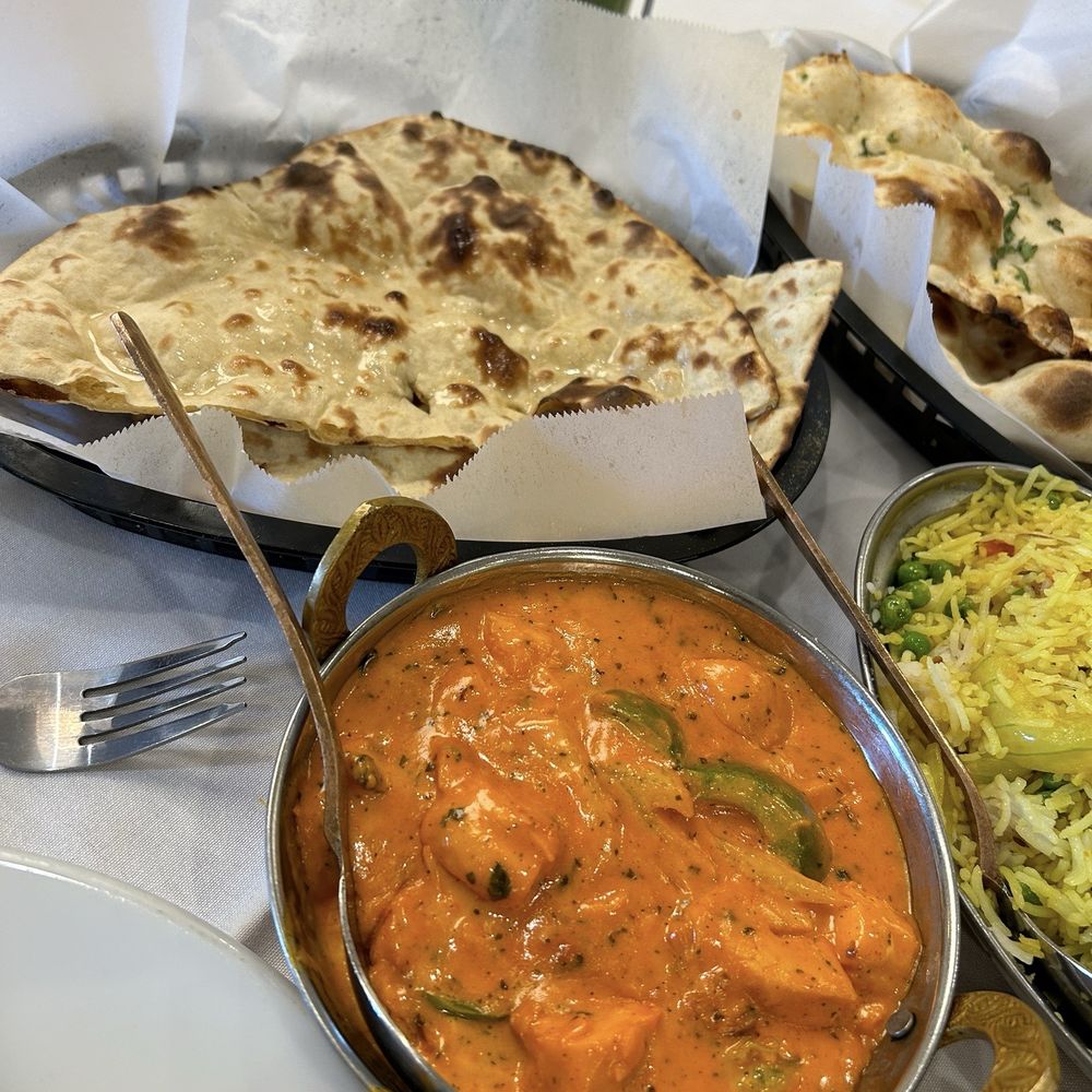 Chicken Tikka Masala ($20.95) and Tandoori Roti ($1.95) Chicken Tikka Masala ($20.95) and Tandoori Roti ($1.95)