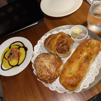 Doris Metropolitan - Fresh bread with olive oil - New American Near Me - New Orleans, Louisiana