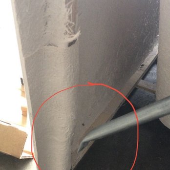 Ferguson Home - Wow... - A photo showing the corner of a metallic object with a red circle emphasizing a particular spot near the edge. - Kitchen & Bath Near Me - Oak Brook, Illinois