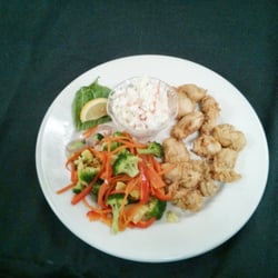 Fried oysters with fresh vegis and house made cole slaw