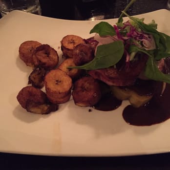 Mayan Cafe - The chicken entree with plantains and mole - Latin American Near Me - Louisville, Kentucky