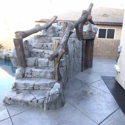 a stone staircase leading to a pool a stone staircase leading to a pool