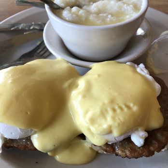 Flamingo Cafe - Eggs Benedict on biscuit w/ sausage and grits - Cafes Near Me - Palm Bch Gdns, Florida