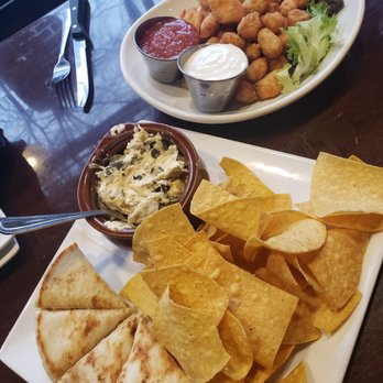 Brick and Porter - Spinach artichoke dip and cheese curds - Pubs Near Me - Grand Rapids, Michigan Brick and Porter - Spinach artichoke dip and cheese curds - Pubs Near Me - Grand Rapids, Michigan