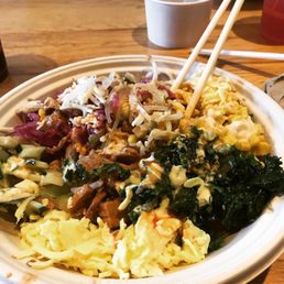 Spicy Chicken Bowl with pickled cabbage, noodles, kale, egg, cheese, yum yum sauce, sesame ginger, and sriracha. Oh and cucumbers and corn Spicy Chicken Bowl with pickled cabbage, noodles, kale, egg, cheese, yum yum sauce, sesame ginger, and sriracha. Oh and cucumbers and corn