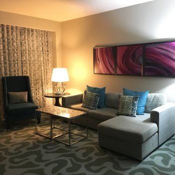 Wyndham Grand Jupiter at Harbourside Place - Suite: living area sofa bed - Hotels Near Me - Jupiter, Florida