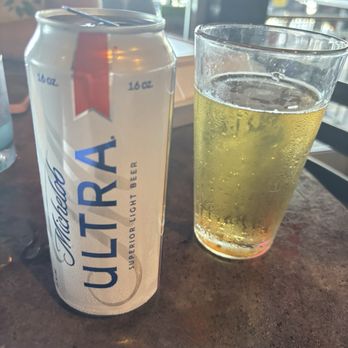 Harry's Taphouse & Kitchen - Ultra in tall cans - they offer a cold glass to pour it in. - Sports Bars Near Me - Jeffersonville, Indiana Harry's Taphouse & Kitchen - Ultra in tall cans - they offer a cold glass to pour it in. - Sports Bars Near Me - Jeffersonville, Indiana